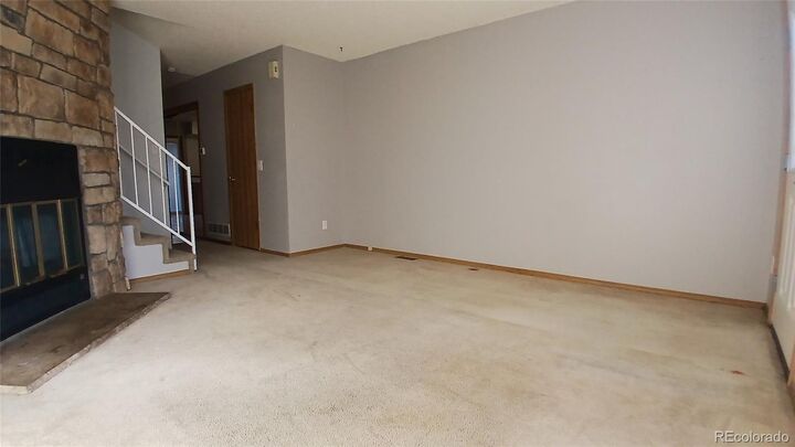 Property Photo:  1699 S Trenton Street 13  CO 80231 