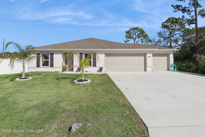 Property Photo: 1401 Denali Street SE FL 32909