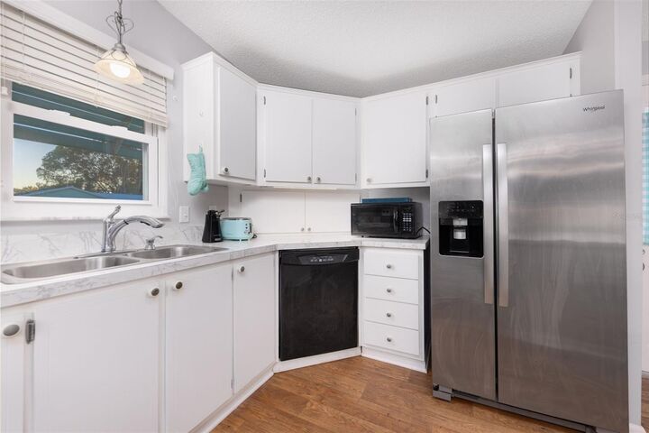 Property Photo:  605 Rainbow Boulevard  FL 32159 