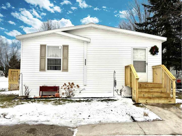 Property Photo:  6685 M66 N Lot 121  MI 49720 