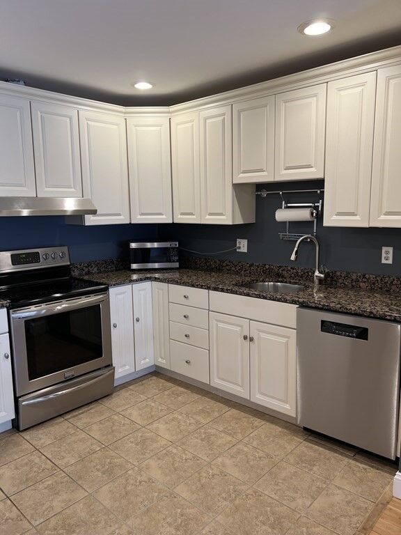 Property Photo:  33 Sleeper 410  MA 02210 