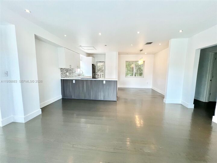 Property Photo: 125 NW 100th St FL 33150