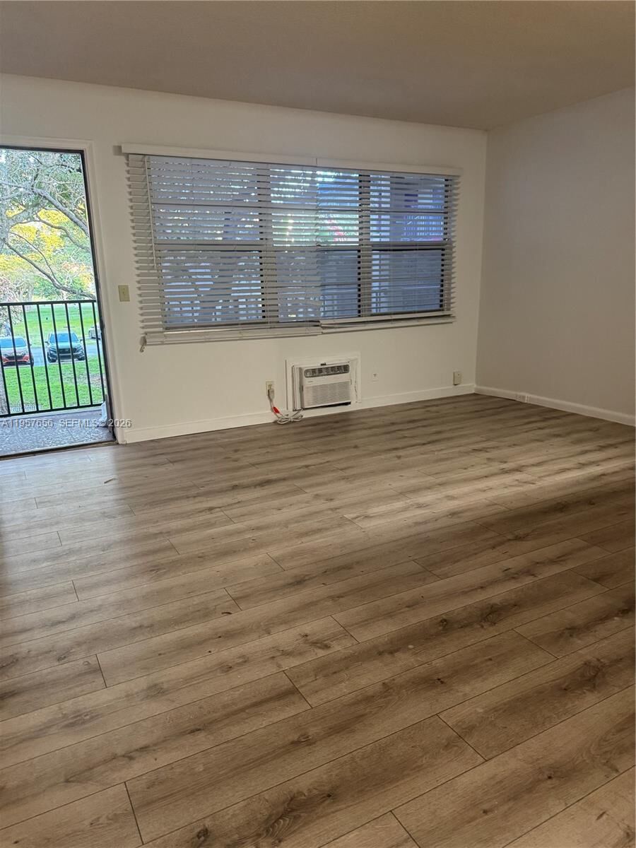 Property Photo:  200 SW 132nd Way 207L  FL 33027 