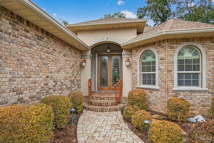 Property Photo:  5826 Sword Fern Way  FL 32526 