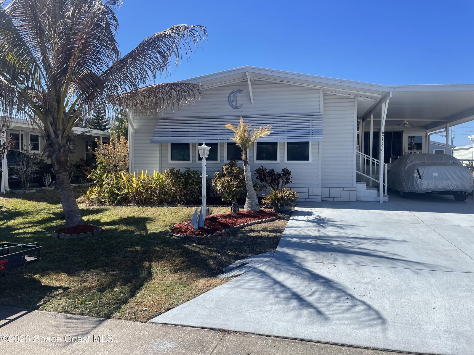 Property Photo:  7566 Montauk Avenue  FL 32976 