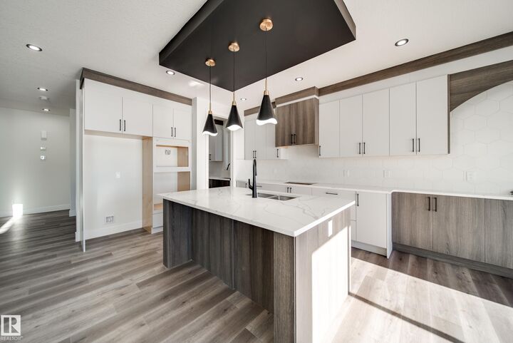 Property Photo:  7023 177 Avenue NW  AB T5Z 0W9 