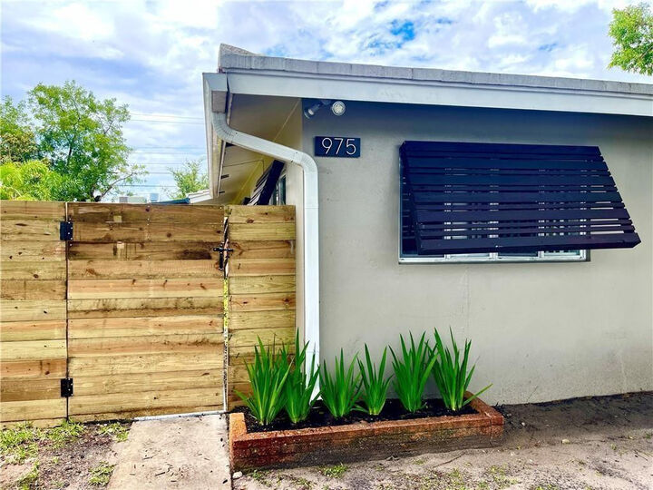 Property Photo:  975 NE 40th Street A  FL 33334 