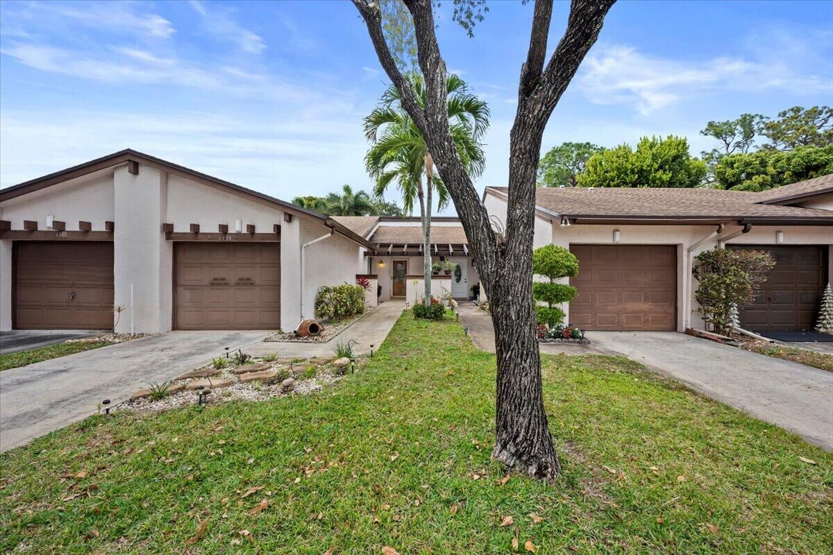 Property Photo:  6138 Elsinore Circle  FL 33463 