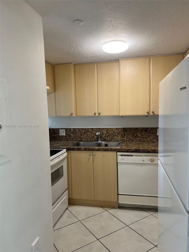 Property Photo:  12645 SW 91st St 202  FL 33186 