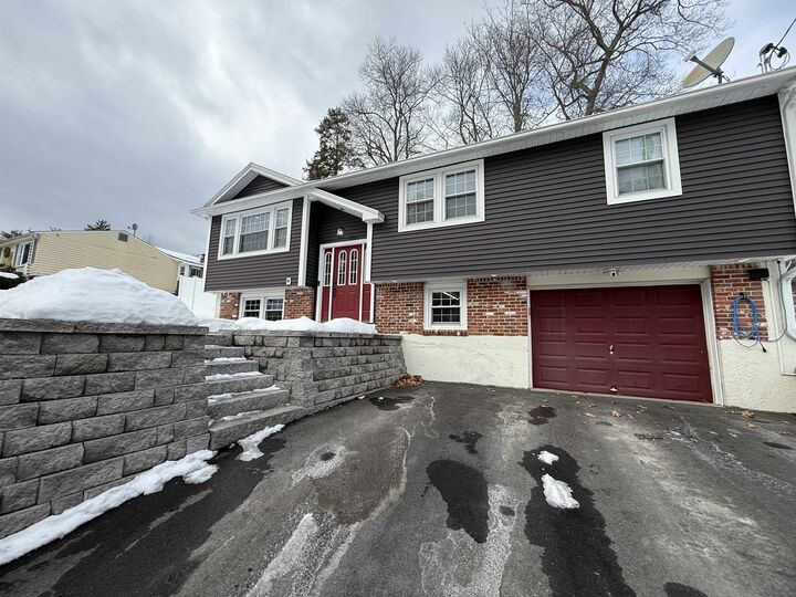 Property Photo:  15 Dover Street  NH 03063 