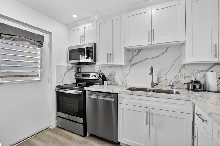 Property Photo:  5700 NW 2nd Avenue Apt 711  FL 33487 