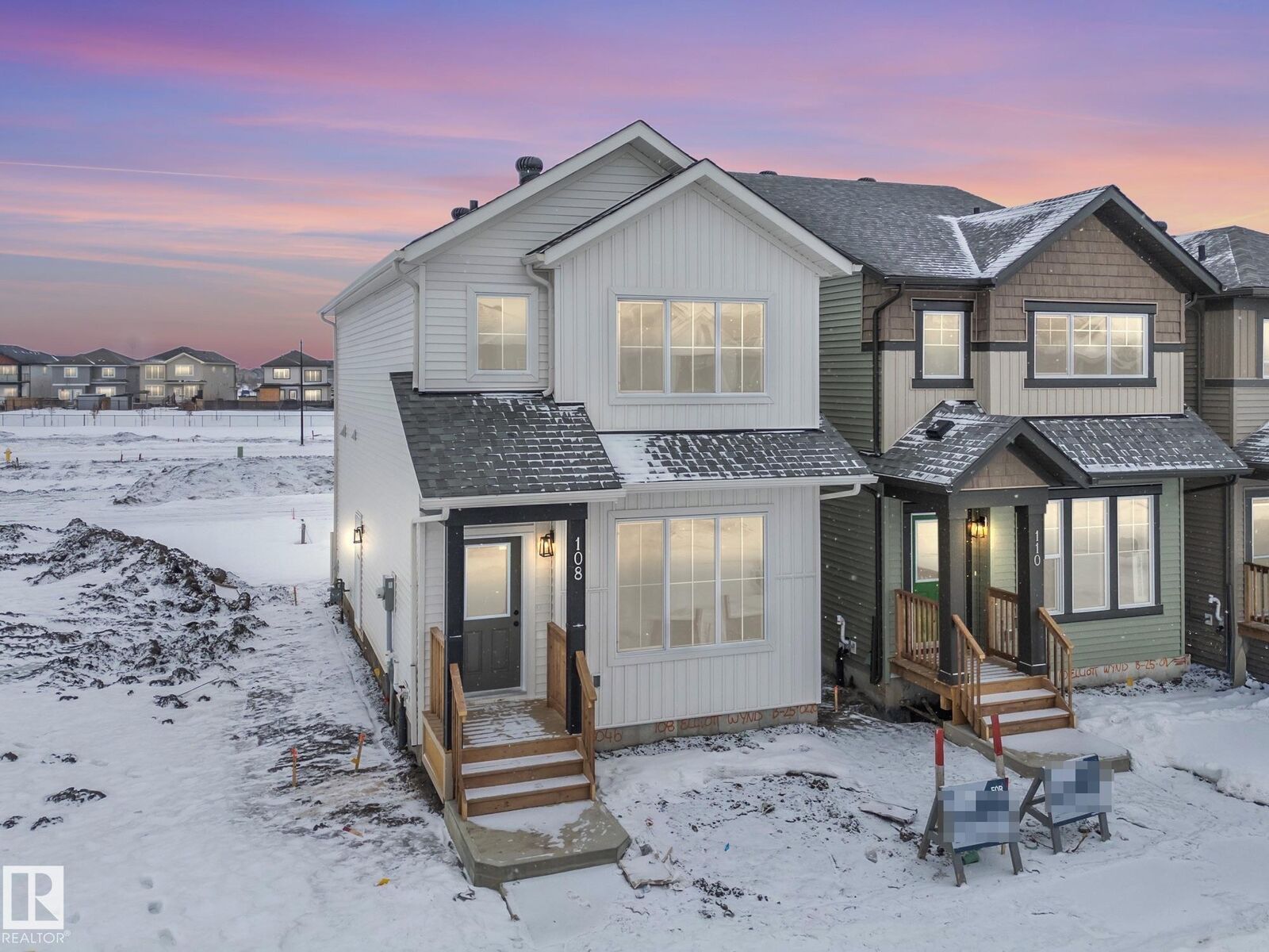 Property Photo: 108 Elliott Wynd AB T8L 1R8