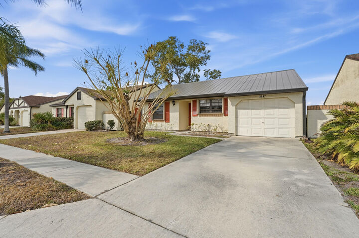 Property Photo:  2287 SE Barrington Street  FL 34952 