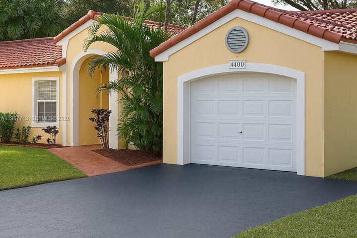 Property Photo:  4400 NW 61st Pl  FL 33073 