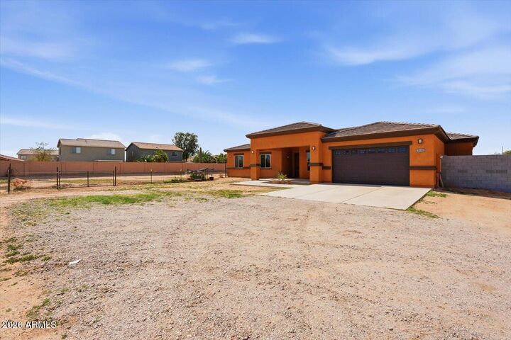 Property Photo: 7124 S 257th Drive AZ 85326