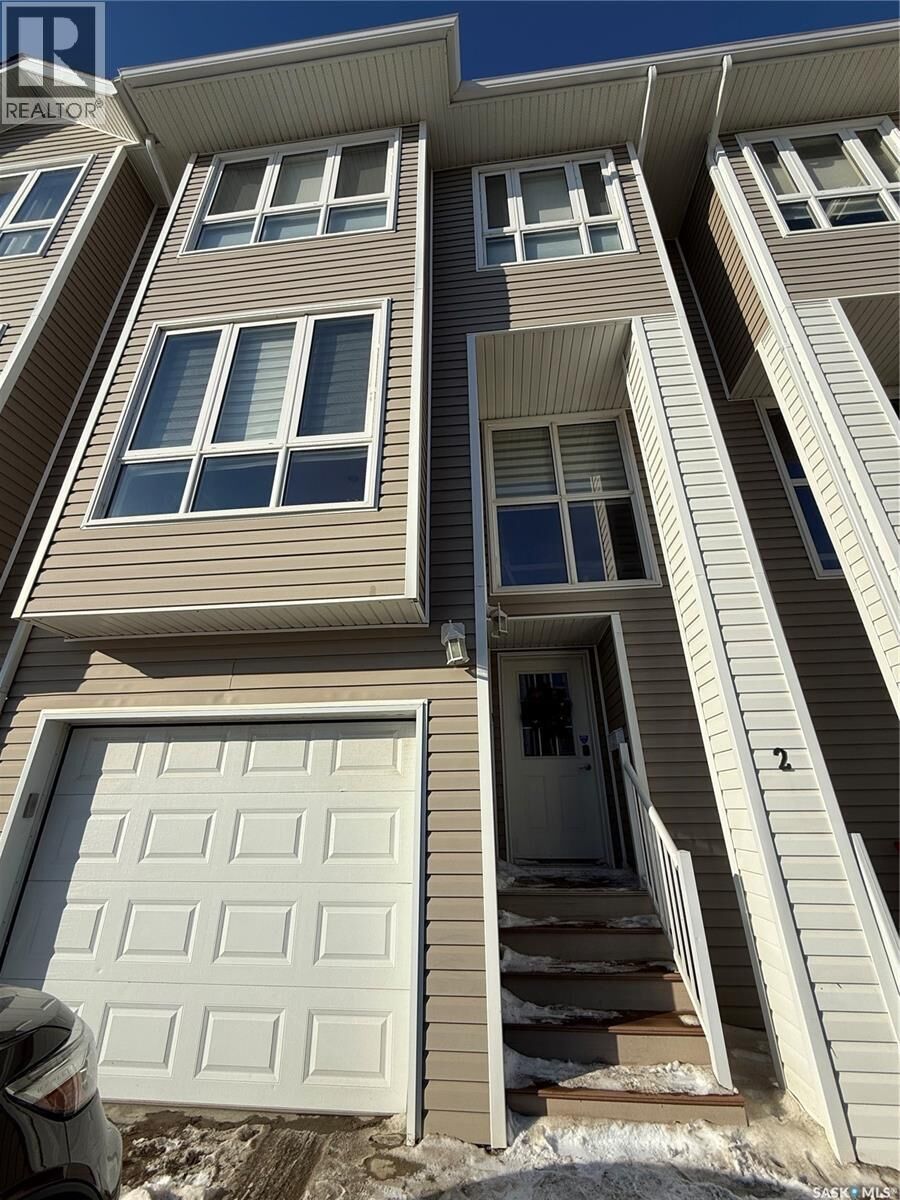 Property Photo: 2 697 Sun Valley Drive SK S4A 2X7