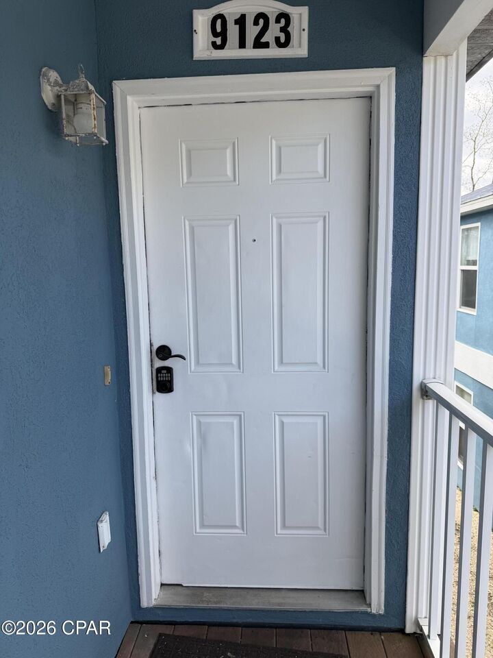 Property Photo:  9117 Laird Street 9123  FL 32408 