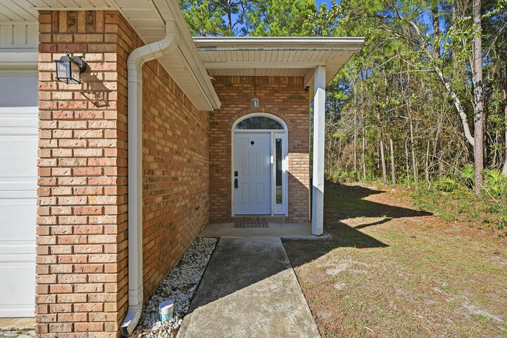 Property Photo:  135 Noblat Drive  FL 32569 