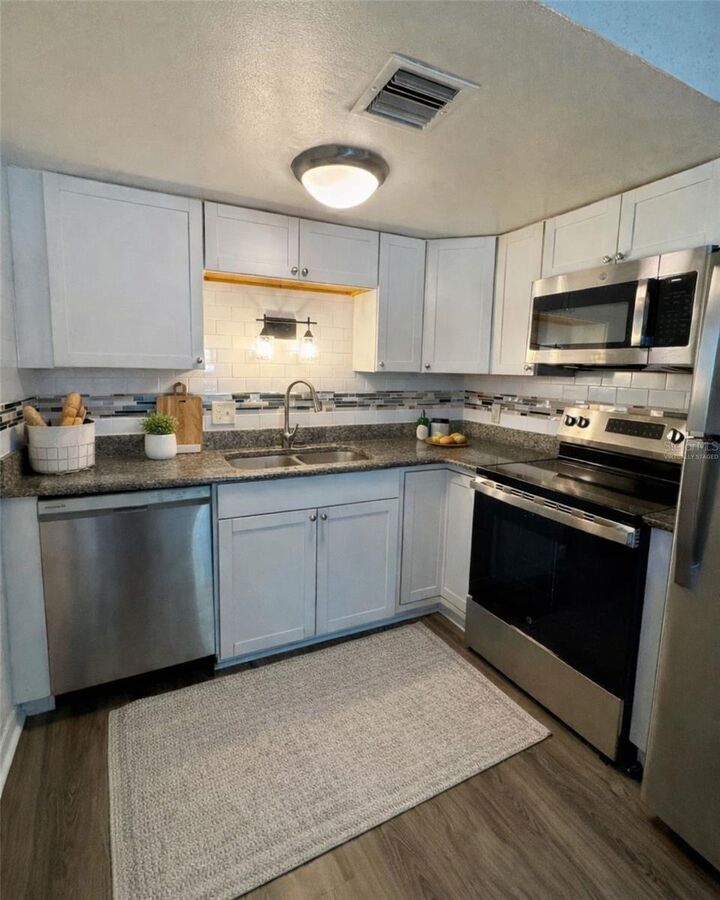 Property Photo:  1142 Sunset Point Road 15  FL 33755 