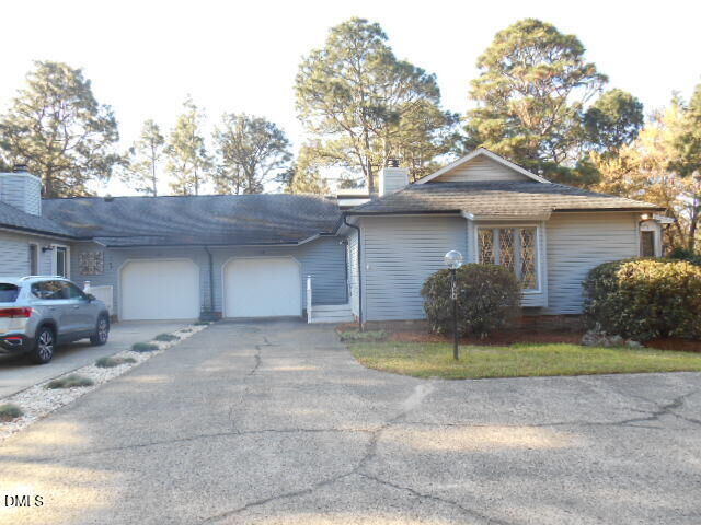 Property Photo:  106 Sandham Court  NC 27376 