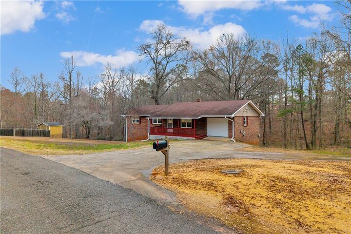 Property Photo:  32 Cox Road SE  GA 30121 