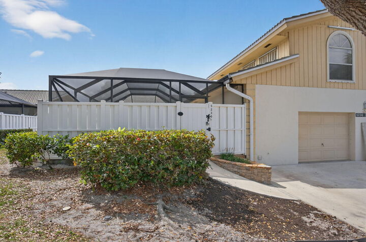 Property Photo:  5230 Woodruff Lane  FL 33418 