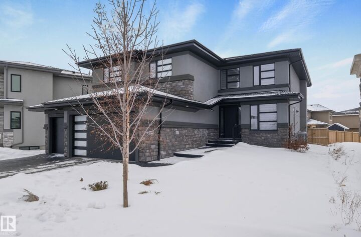 Property Photo: 4086 Whispering River Drive SW AB T6W 2E2