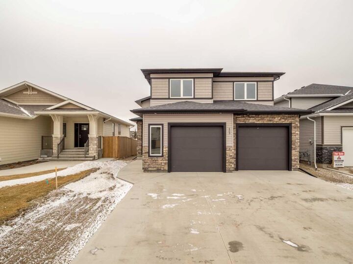 Property Photo:  409 Rivergrove Chase W  AB T1K 8E9 