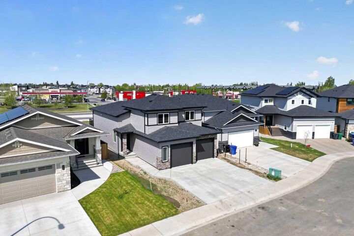 Property Photo:  409 Rivergrove Chase W  AB T1K 8E9 