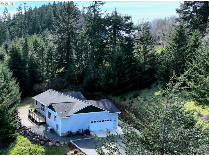 Property Photo:  98205 Sunforest Ct  OR 97415 