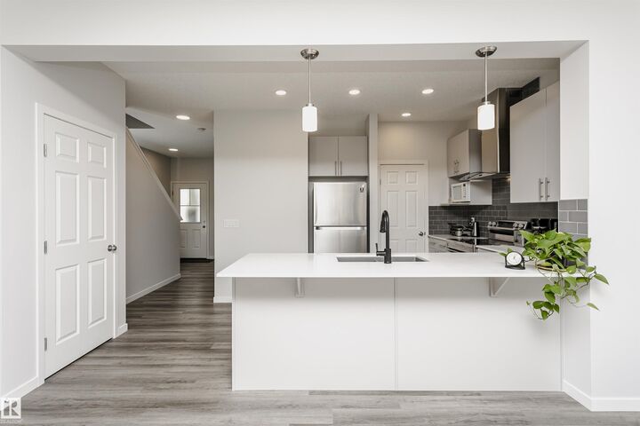 Property Photo: 1640 Erker Way NW AB T6M 0Z8