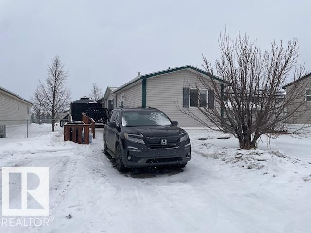Property Photo: 328 Maple Wood Drive NW AB T6P 0A8