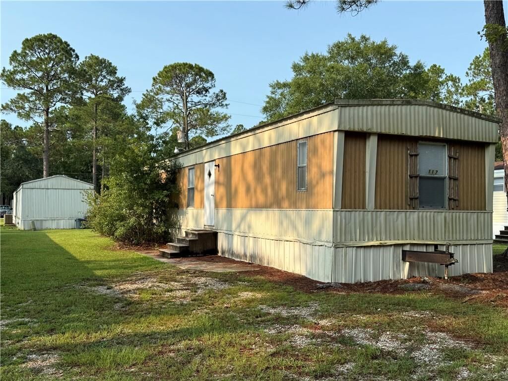 Property Photo:  64096 Mangano Road 117  LA 70452 