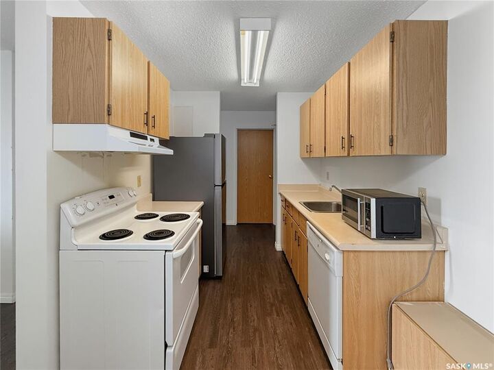 Property Photo: 1110 9th Avenue NE 301 SK S9H 2S9