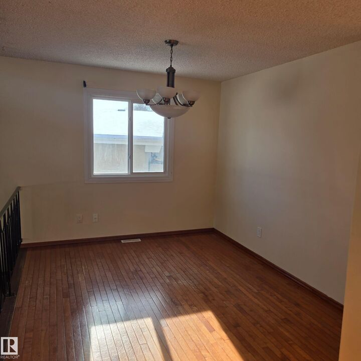 Property Photo:  3105 130A Avenue NW  AB T5A 3B6 