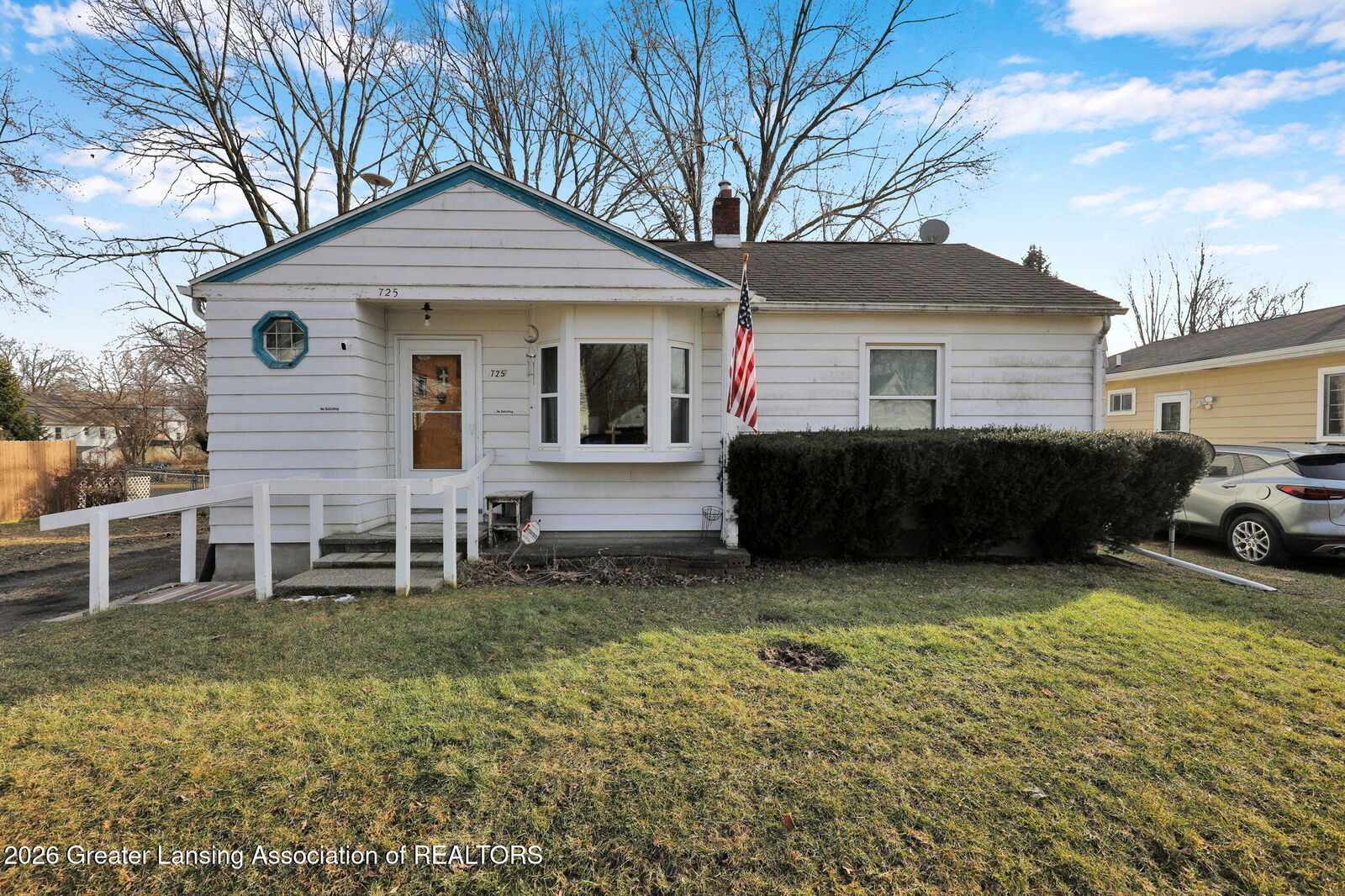 Property Photo:  725 Dunlap Street  MI 48910 