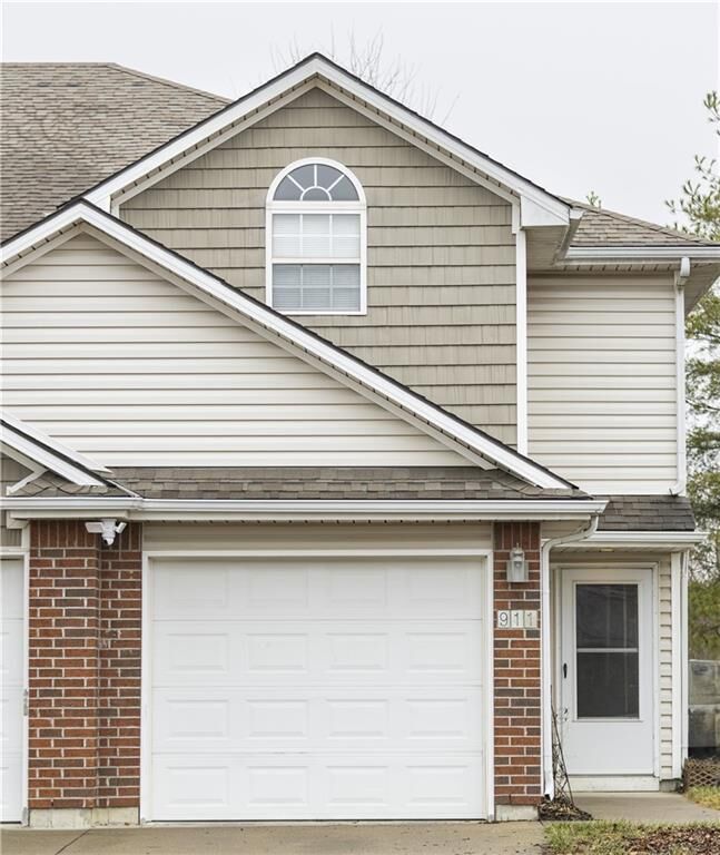 Property Photo:  911 SW Peach Tree Lane  MO 64064 