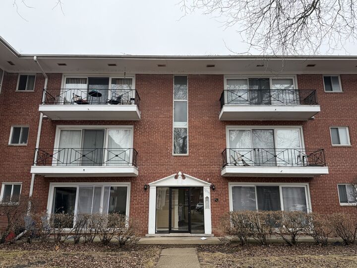 Property Photo: 10111 Old Orchard Court 203 IL 60076