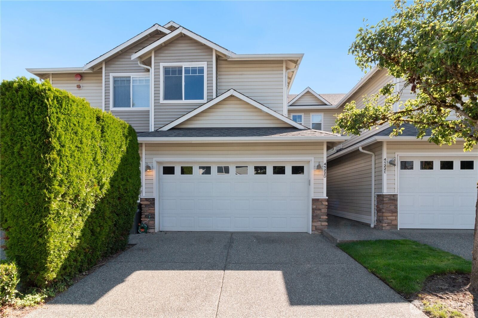 Property Photo:  4122  214th Street SW D  WA 98043 
