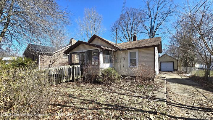 Property Photo:  1111 Regent Street  MI 48912 