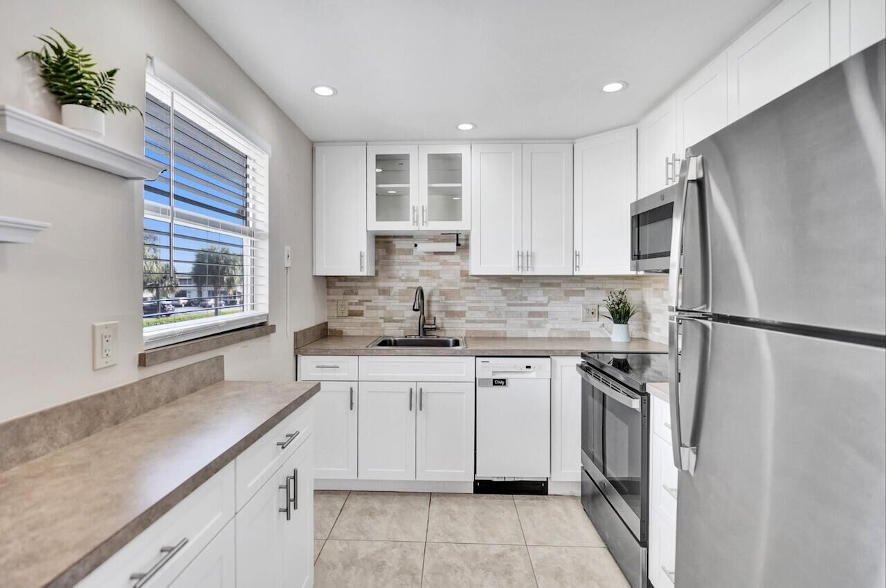 Property Photo:  505 Monaco K  FL 33446 