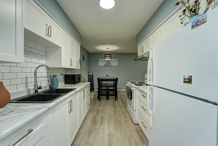 Property Photo: 33450 George Ferguson Way 202 BC V2S 2L8
