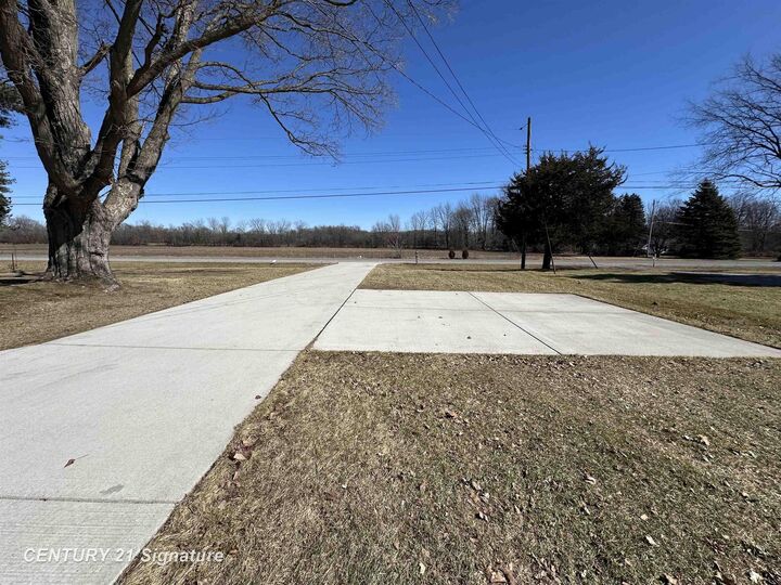 Property Photo:  7151 N Elms Road  MI 48433 