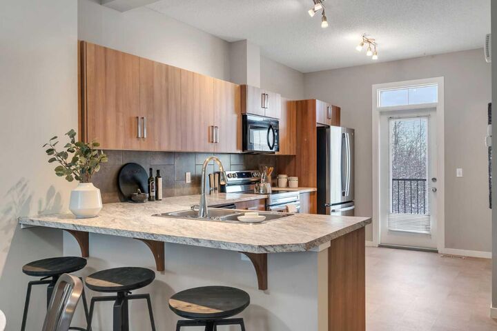 Property Photo:  34 New Brighton Point SE  AB T2Z 1B6 