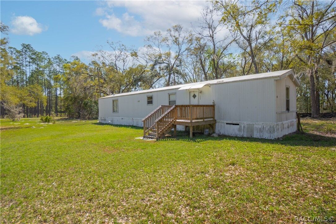 Property Photo:  5590 NW 76th Avenue  FL 32626 
