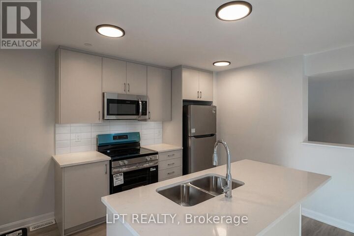 Property Photo:  401 Glenroy Gilbert Drive 20  ON K2J 5W2 