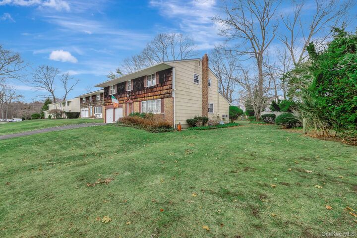 Property Photo: 61 Hurtin Boulevard NY 11787