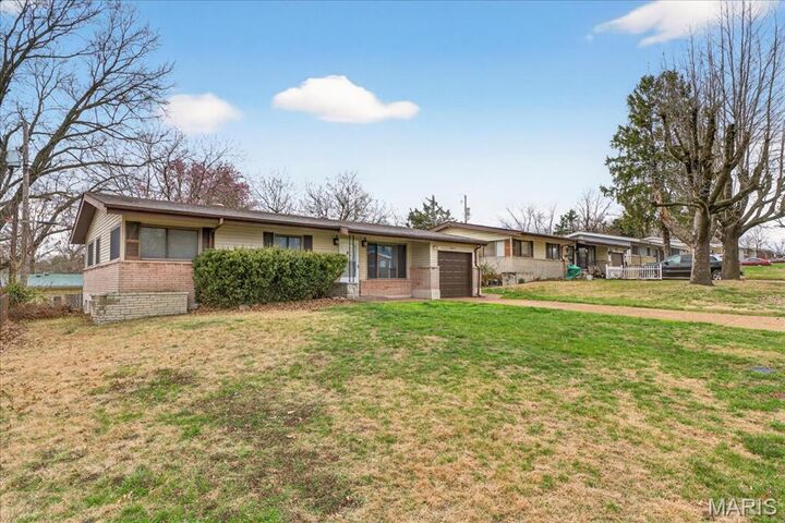 Property Photo:  10217 Viscount Drive  MO 63136 