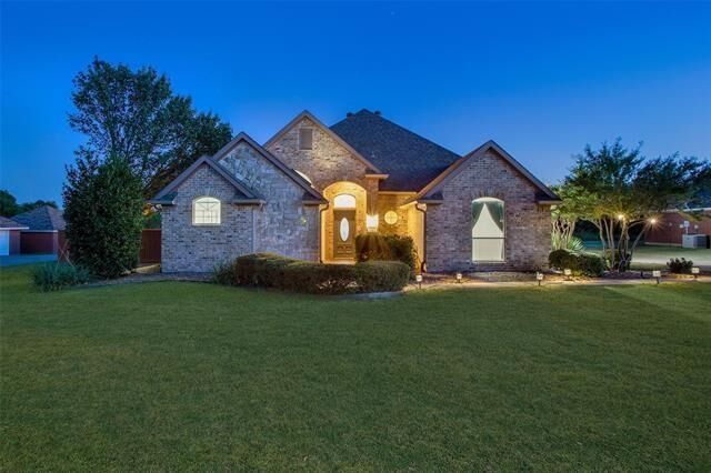 Property Photo:  202 Tee Taw  TX 75092 