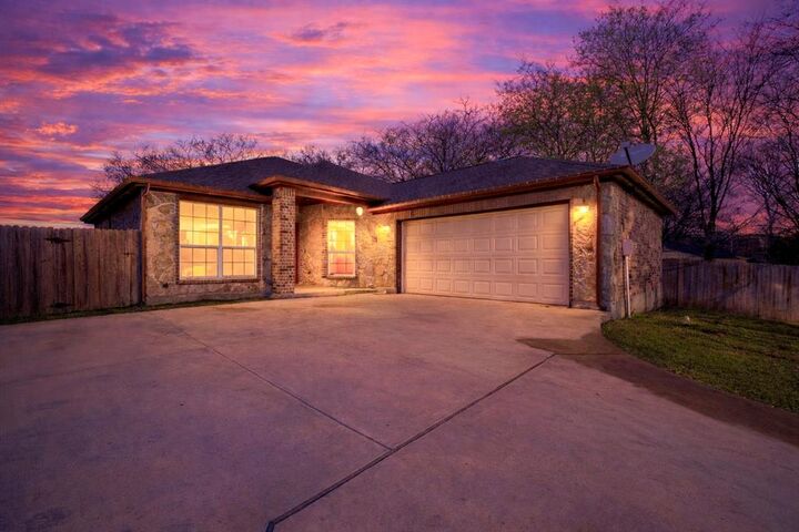 Property Photo: 110 S Watson Street TX 76009